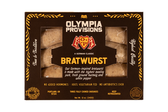 Olympia Provisions German Bratwurst with nutmeg and white pepper, in black packaging.