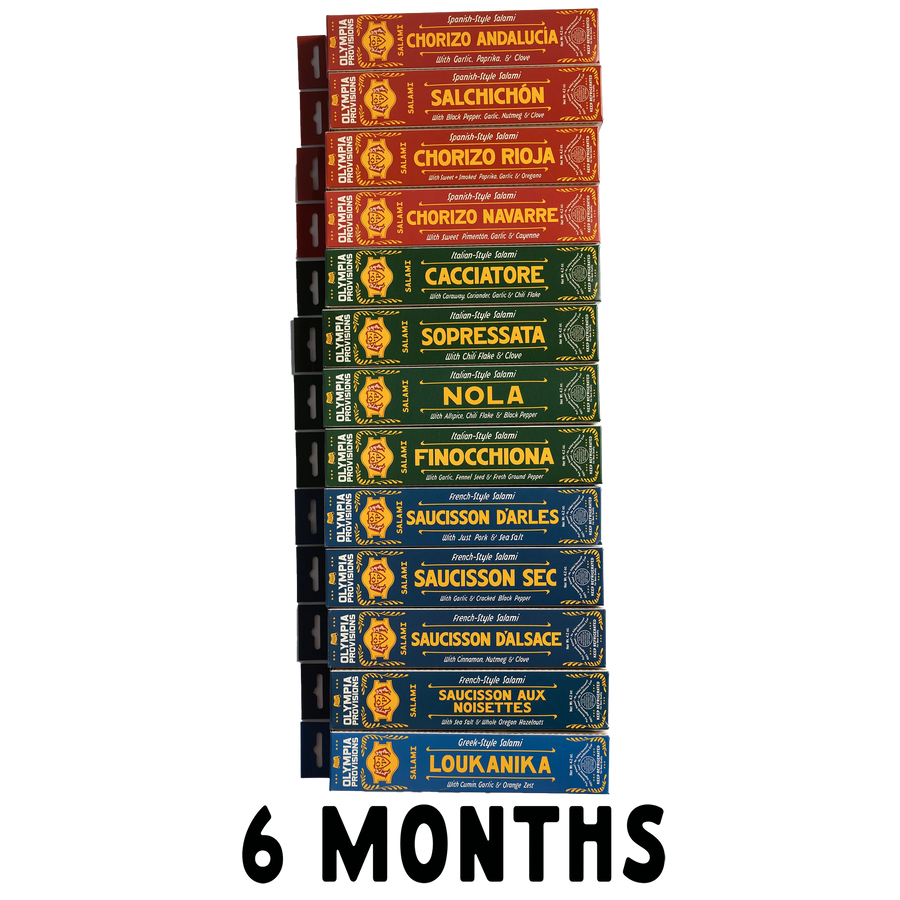 Vertical stack of 12 varied French, Spanish, Italian, and Greek Olympia Provisions Salami with the words "6 Months" at the bottom.
