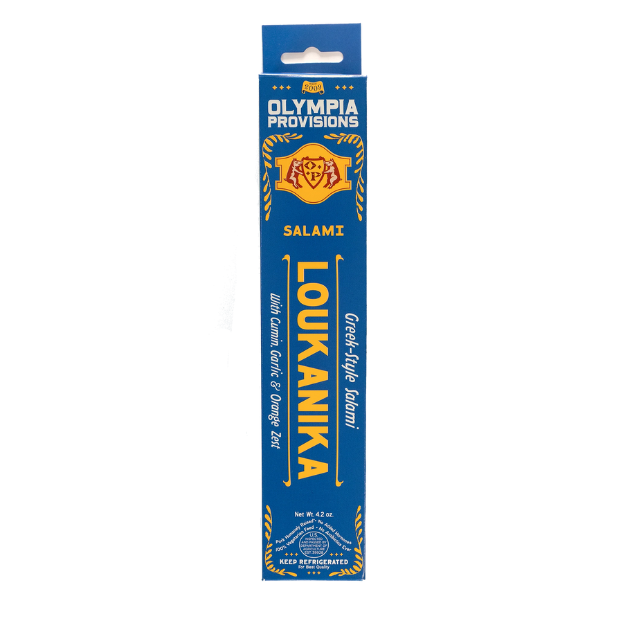 Olympia Provisions Loukanika with cumin, garlic, and orange zest, packaged in a light blue box.