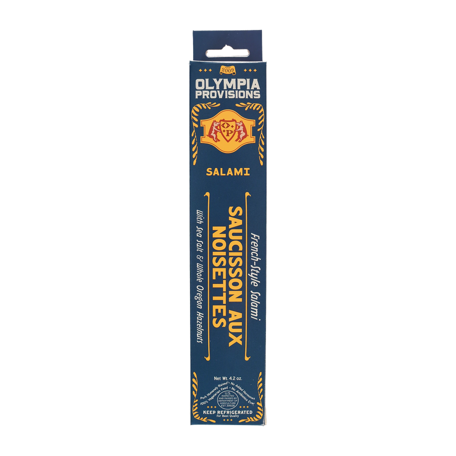 Olympia Provisions Saucisson aux Noisette with sea salt and Oregon hazelnuts, packaged in a blue box.